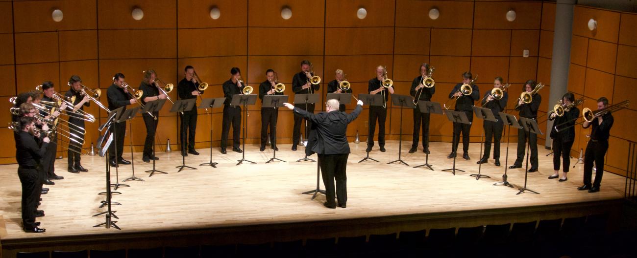 Joshua Bynum conducts the Trombone Choir.