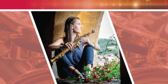 Caroline Halleck sitting with flowers holding a saxophone