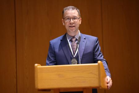 Daniel Ellis, academic professional in opera and musical theatre, receiving the Hendrix College Odyssey Award September 26, 2024.