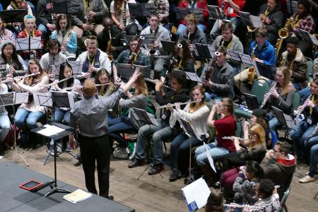 Scott Pannell, assistant director of bands for North Cobb High School, conducts high school musicians Jan. 22 as part of the UGA Hugh Hodgson School of Music's JanFest event at the Classic Center.	