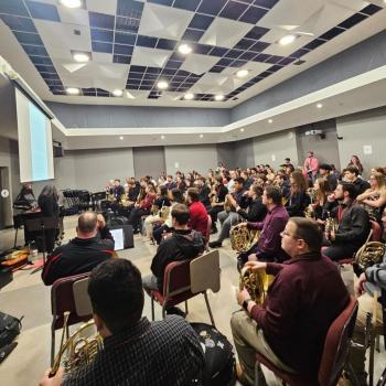 Students gathered for a master class presentation in the Choral Suite in the School of Music Building.