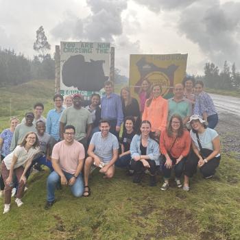 All but one of the complete group of students and faculty from UGA at the equator line in Nairobi, Kenya.